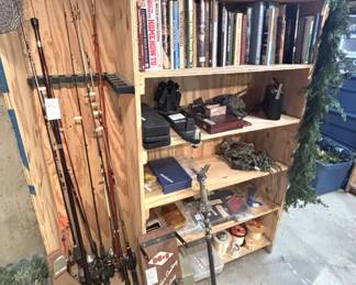 Various fishing poles, fishing supplies, Vintage fishing line winder.