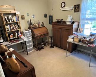 This room is full of books, dvds, cds and lovely furnishings.