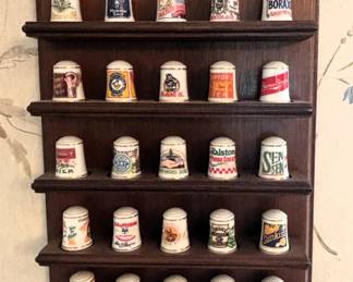 Thimble collection w/display shelf.