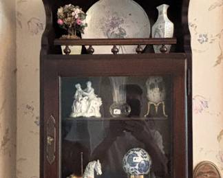 Display cabinet filled with goodies.
