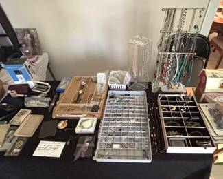 Lots of costume jewelry, some sterling jewelry, rosaries, misc. collectibles.