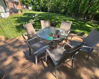 Patio table with six chairs.