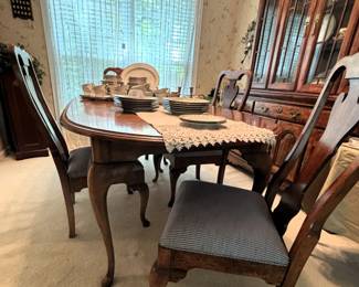 BUY IT NOW! $250.00.Table w/six Chairs( two arm chairs), w/2 15" leaves and custom table pads. 42" W x 66" L (96" L w/both leaves ). Call Jan at 314 960-5700.