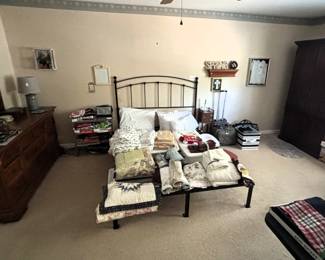 Master bedroom has a large amount of very nice items.