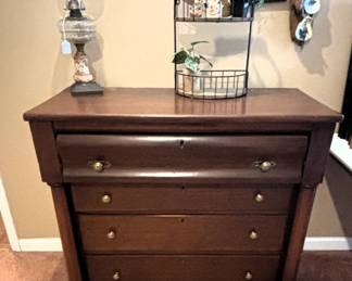 BUY IT NOW! $125.00. Empire style antique chest of drawers. 40" W x 19 1/2" D x 36" H. Call Jan at 314 960-5700.