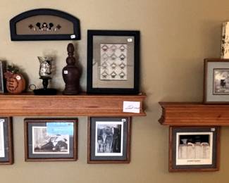 Wall shelves and framed wall hangings.