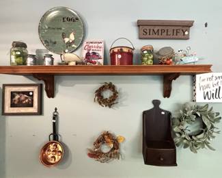 Variety of wall hangings and shelf items. We just love all her fun decorations!