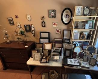 Picture frames and wall hangings.