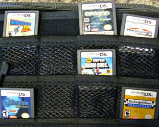 Nintendo DS  traveling case with charger, and games