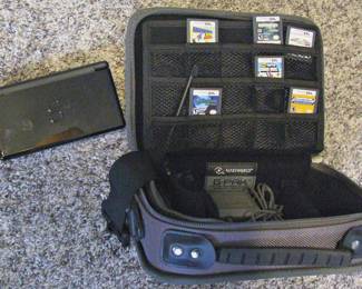 Nintendo DS  traveling case with charger, and games