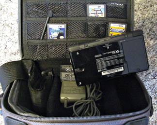 Nintendo DS  traveling case with charger, and games