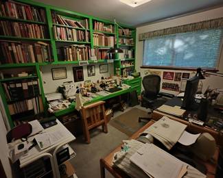 Office with office supplies and books for all genres