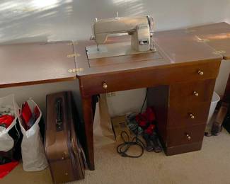 Sewing is a really nice hobby and very, very useful.  If you're just getting into it, consider this vintage Kenmore.  Not fancy, but likely all metal and will last for a lifetime.