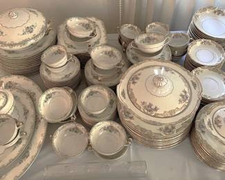 Vintage Noritake china set with Morimura ‘M in wreath’ Japan backstamp, likely pre-WWII. Floral pattern with ornate metallic trim. Large matching service set including serving pieces. Appears to be in excellent condition.
