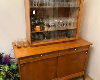 If you needed a place to store your crystalware, consider this Heywood-Wakefield combination.