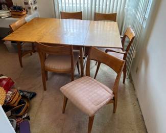 This table and chair set is Heywood-Wakefield, known for it's excellent design and quality.