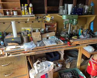Here are several vases, a set of drill bit wire brushes, a "come-along", a table-top drill press, and more.