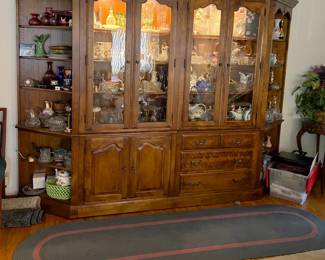 This lighted display cabinet really creates a statement for the room and your collection, whatever that might be.
