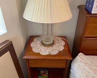 See?  Two nightstands, two lamps, two doilies.  Come on by and see the pair of them, or the bed in between.