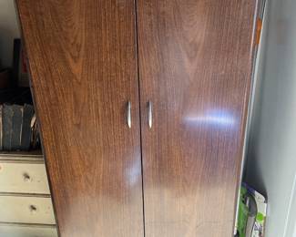 And then there is this side-by-side, faux wood paneled refrigerator.