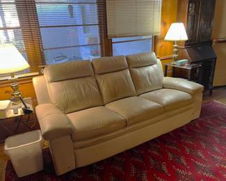 This sofa looks very comfortable, with low enough armrests even a tall person could nap on it.