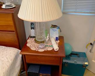 This photo, and the next one, show a pair of nightstands and lamps (and doilies if we're counting).