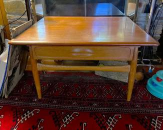 This low table has some style and could be used in a variety of places.