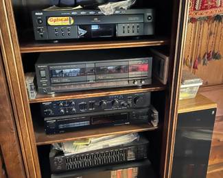 Here is the set of consumer audio equipment: the turntable, 5-disc CD player, double-cassette player, stereo tuner, stereo graphic EQ, and power amplifier.  Off to the right is one of the Acoustic Research speakers.