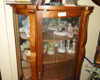 Curio cabinet and what is in it or on top