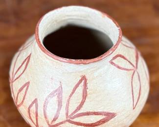 This lot features a Santo Domingo pottery pot likely circa 1920s that measures, 6” H and is in very good condition.