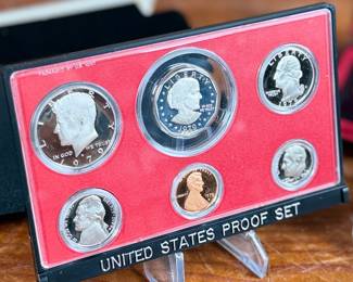 This lot features a Canadian silver dollar composed of 50% silver and a United States proof set from 1979.