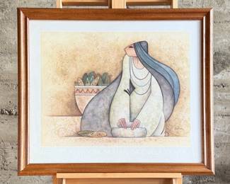 "Mujer Con Metate", a professionally framed print by listed artist, G.E. Mullan circa 1980s. Professionally framed and measures in frame, 28.5” H x 33.5” W.