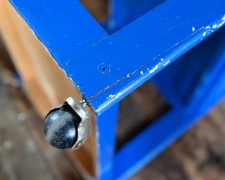 This lot features a two (2) piece wooden book or bar cart on casters with a fold down shelf. This cabinet measures, 65” H x 29.5” W x 19.5” D. Small crack that could be repaired on a caster as shown in photos.
