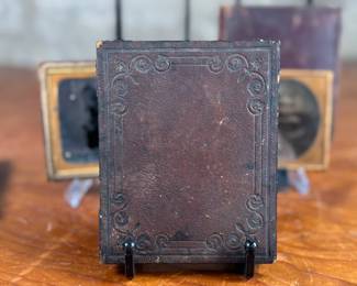 This lot features a large collection of daguerreotypes and tintype photographs.