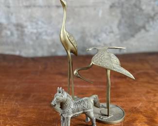 This lot features a collection of three (3) vintage brass animals with the tallest measuring, 12” H.