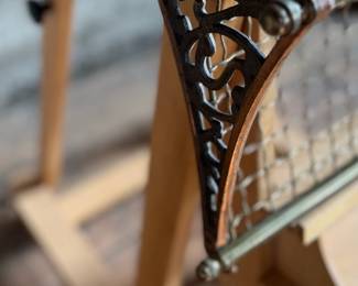 This lot features an antique brass train car luggage rack in very good condition that measures, 29.5” W x 12.5” D.