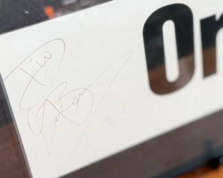 This lot features a card from the American Family Insurance event in 1999 signed by artist George Benson and his band members. Professionally framed and measures in frame, 7.25” H x 16.75” W.