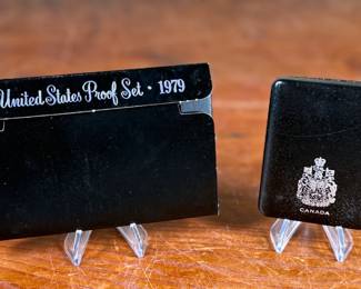 This lot features a Canadian silver dollar composed of 50% silver and a United States proof set from 1979.