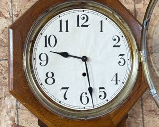This lot features an antique 8-day clock in good running condition with a Sessions movement. Includes key and measures, 25” H x 16” W.