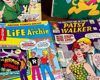 This lot features a large collection of antique comic books with numerous titles including, Top Cat, Patsy Walker, Archie, and more.