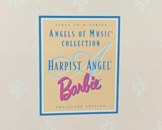 This lot features a Mattel Angels of Music Collection Harpist Angel Barbie Doll, released as a Collector Edition in 1997. This doll is the first in a series titled the “Angels of Music Collection”. The doll features a periwinkle chiffon gown with a butterscotch satin underlay and holds a golden harp. It is designed as a “Collector Edition” and features delicate feather wings. Brand new condition.