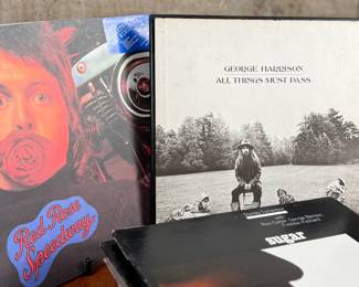 This lot features a large collection of twenty-six (26) vinyl records including artists Barbara Streisand, Aretha Franklin, Ray Charles, George Harrison, and many others.