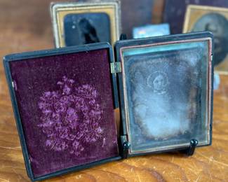 This lot features a large collection of daguerreotypes and tintype photographs.