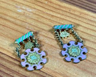 This lot features a pair of Odd Fellows enamel medals or brooches from Oregon in very good condition.