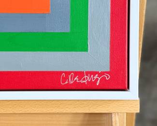 “Offset″, an original acrylic on canvas by listed artist, Camilo Requejo. Measures in frame, 21” H X 21” W. Requejo (1976-) is a Mexican-Spanish architect living in the US with more than 20 years of experience in design and construction, including several residential projects, sports, and medical facilities. Requejo started collecting art from recognized painters and sculptors for the past four years, waking up in him the desire of exploring and transporting his architectural style into art manifestation; combining geometric shapes with color combinations into the canvas.
