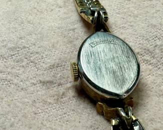 This lot features a 10k gold-filled mechanical watch by Zodiac. Winds and runs.