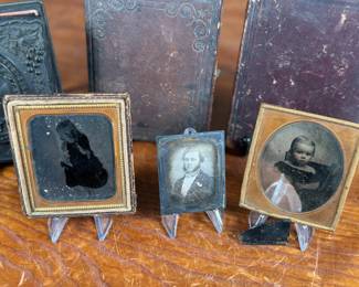 This lot features a large collection of daguerreotypes and tintype photographs.