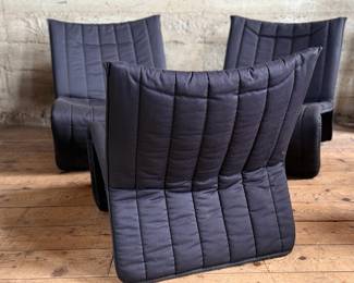 This lot features three (3) Kebe Ribbon Chairs designed by Niels Bendtsen in 1975, featuring a black tubular steel frame and quilted fabric. Each chair measures, 28” H x 25” W x 29” D.