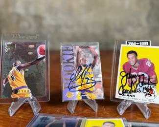 This lot features a collection of sports cards in various conditions. Some athletes include Kobe Bryant, Pat Richter, Emerson Boozer, and others. Some appear to be signed.