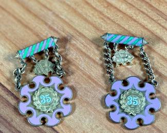 This lot features a pair of Odd Fellows enamel medals or brooches from Oregon in very good condition.